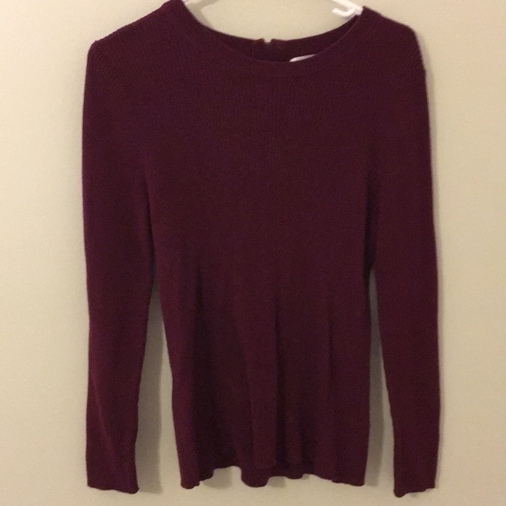 purple shirt with zipper in back